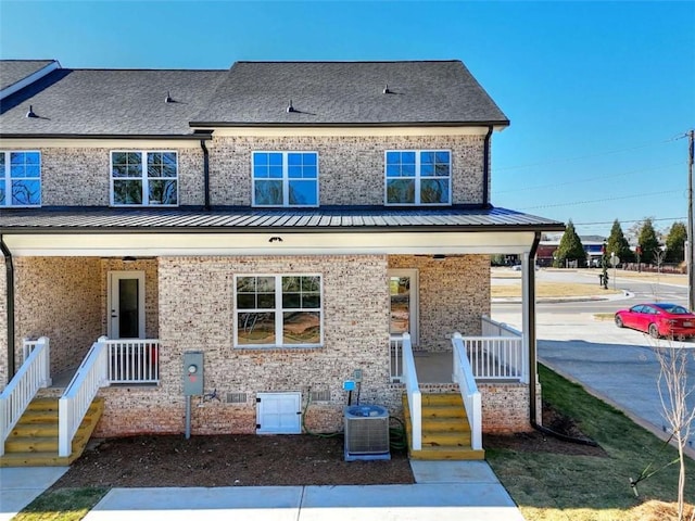 exterior space featuring a porch and cooling unit