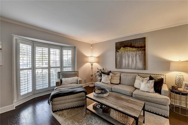 living room with wood finished floors, baseboards, and ornamental molding