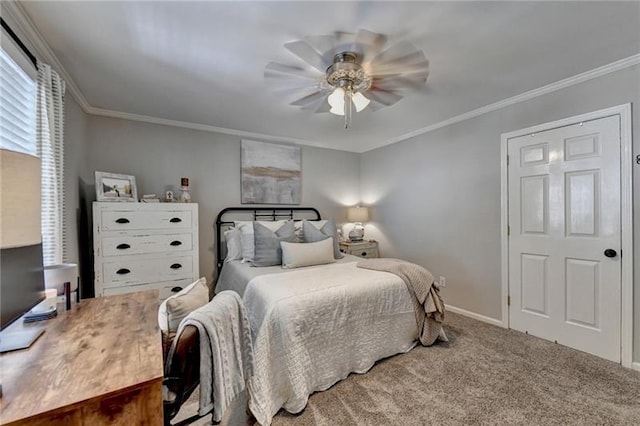 bedroom featuring baseboards, a ceiling fan, carpet, and ornamental molding