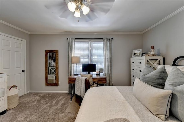 bedroom featuring baseboards, carpet floors, ornamental molding, and a ceiling fan