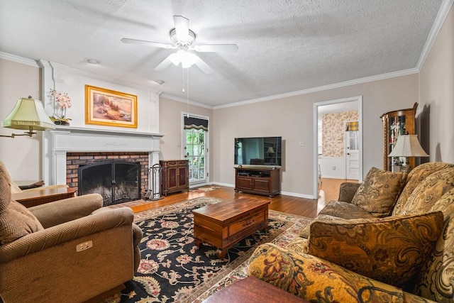 living room with a fireplace, hardwood / wood-style floors, a textured ceiling, and crown molding