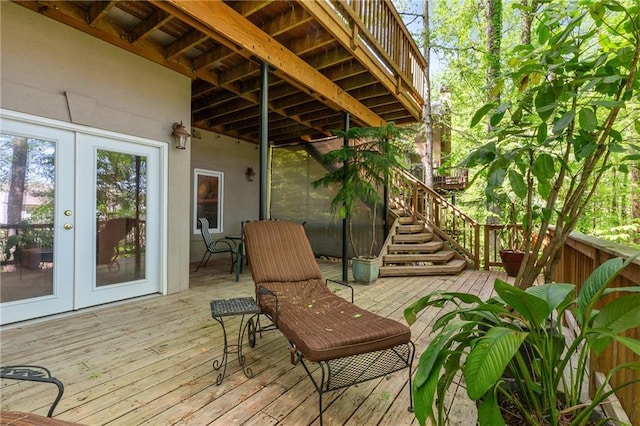 wooden terrace with stairway and french doors