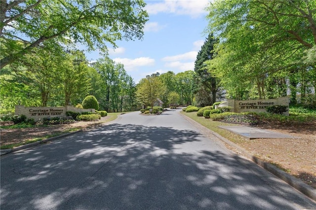view of road featuring curbs