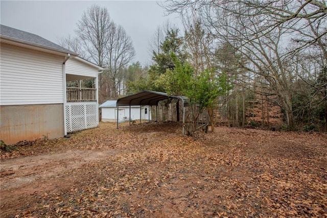 view of yard featuring a carport