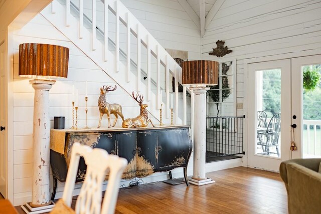 328 Black Ankle Creek Rd, Cherry Log, GA 30522 - interior space featuring lofted ceiling, hardwood / wood-style flooring, wooden walls, and a healthy amount of sunlight
