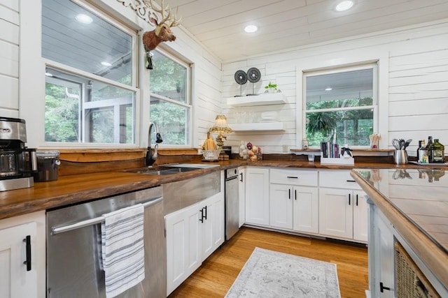 328 Black Ankle Creek Rd, Cherry Log, GA 30522 - kitchen featuring white cabinetry, wooden counters, dishwasher, and wood walls