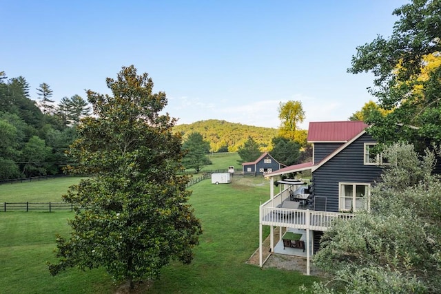 328 Black Ankle Creek Rd, Cherry Log, GA 30522 - view of yard featuring a deck with mountain view, a shed, and a rural view