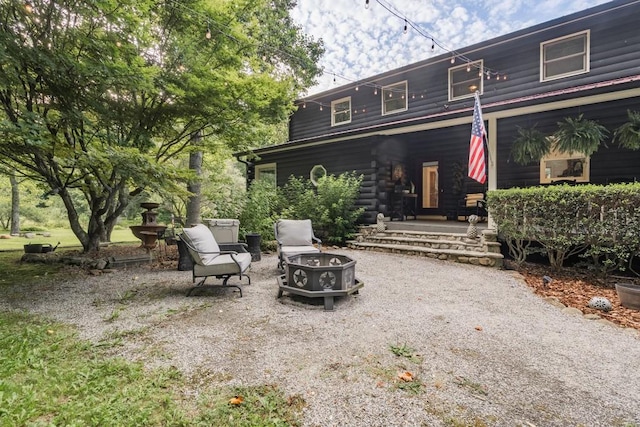 328 Black Ankle Creek Rd, Cherry Log, GA 30522 - rear view of property featuring an outdoor fire pit
