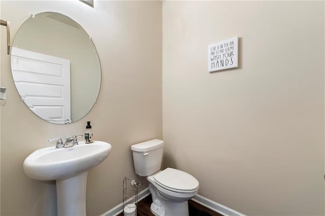 3720 Liverpool Way, Atlanta, GA 30331 - bathroom featuring wood-type flooring, toilet, and sink