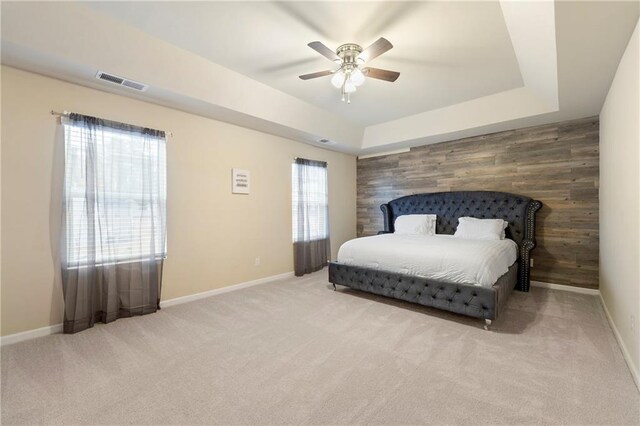 3720 Liverpool Way, Atlanta, GA 30331 - bedroom featuring ceiling fan, a raised ceiling, light colored carpet, and wood walls