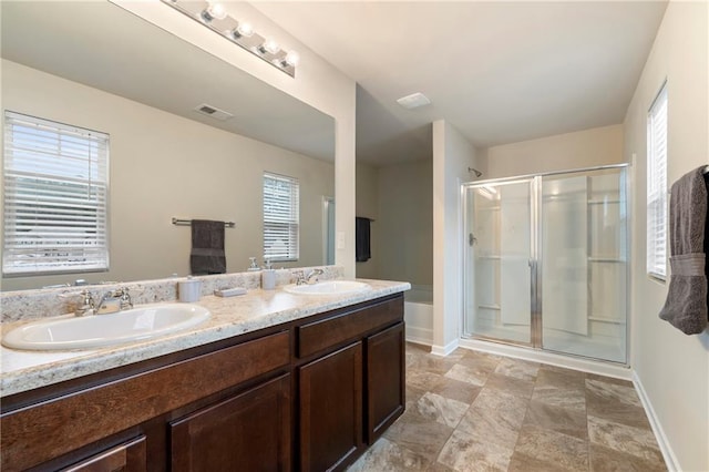 3720 Liverpool Way, Atlanta, GA 30331 - bathroom featuring walk in shower, vanity, and plenty of natural light