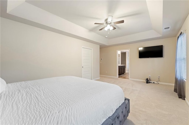 3720 Liverpool Way, Atlanta, GA 30331 - bedroom with ensuite bathroom, light colored carpet, ceiling fan, a tray ceiling, and a closet