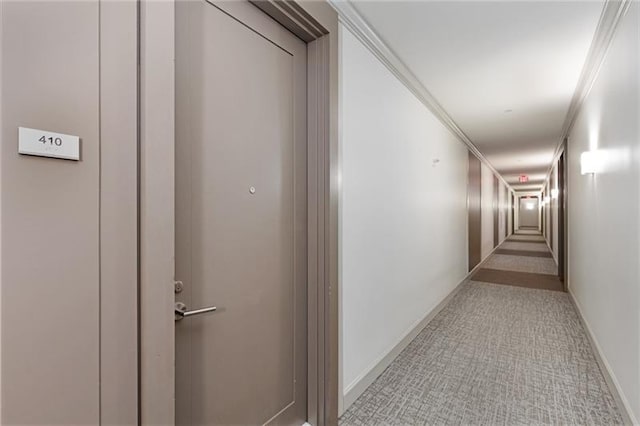 hallway featuring crown molding