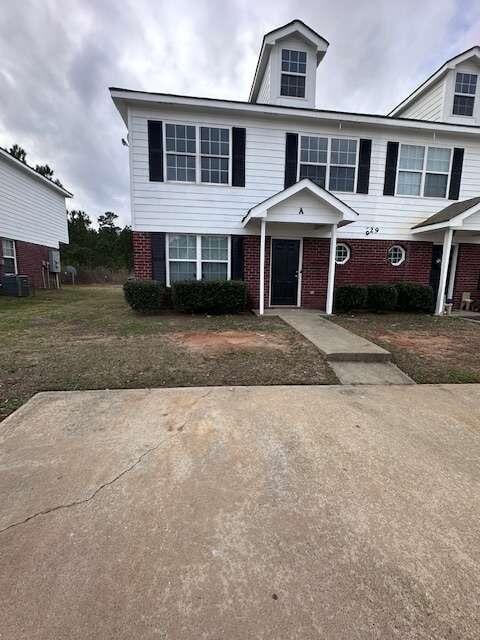 view of front of home with central air condition unit