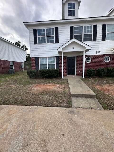 view of front of house with central AC