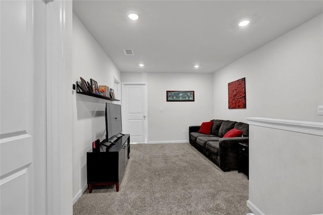 living room with light colored carpet