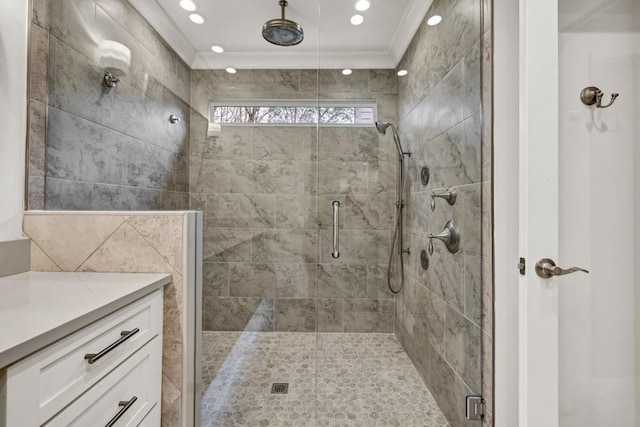 full bathroom with vanity, crown molding, recessed lighting, and a shower stall