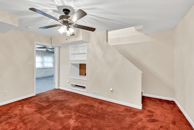 bonus room featuring carpet floors, baseboards, ceiling fan, and visible vents