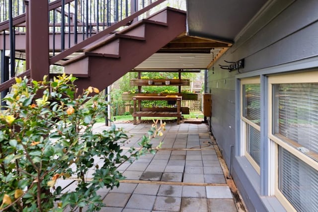 view of patio / terrace with stairway
