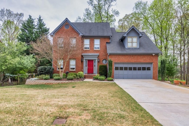 colonial home featuring a front yard, brick siding, and concrete driveway