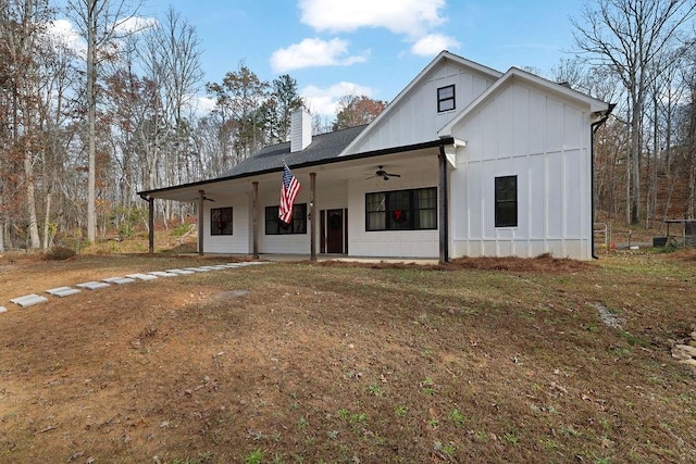 modern inspired farmhouse featuring ceiling fan