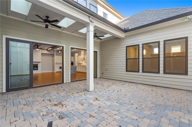 view of patio / terrace featuring ceiling fan