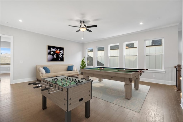 playroom featuring ceiling fan, crown molding, baseboards, and hardwood / wood-style flooring