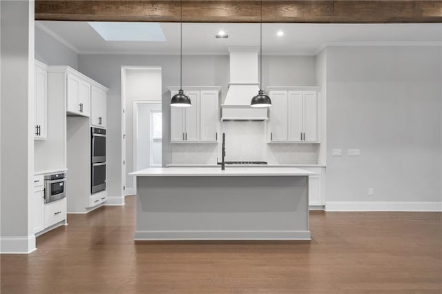 kitchen featuring decorative backsplash, dark wood-type flooring, and stainless steel double oven