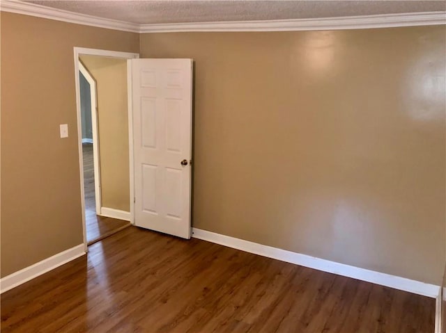 116 Nation Dr, Calhoun, GA 30701 - unfurnished room with dark wood-type flooring, ornamental molding, and a textured ceiling