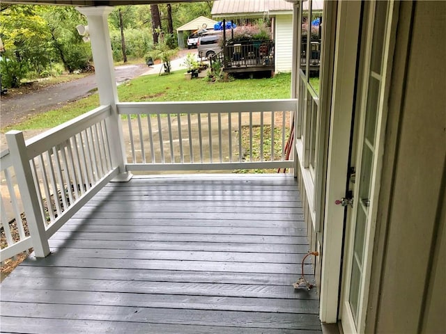 116 Nation Dr, Calhoun, GA 30701 - wooden terrace featuring covered porch