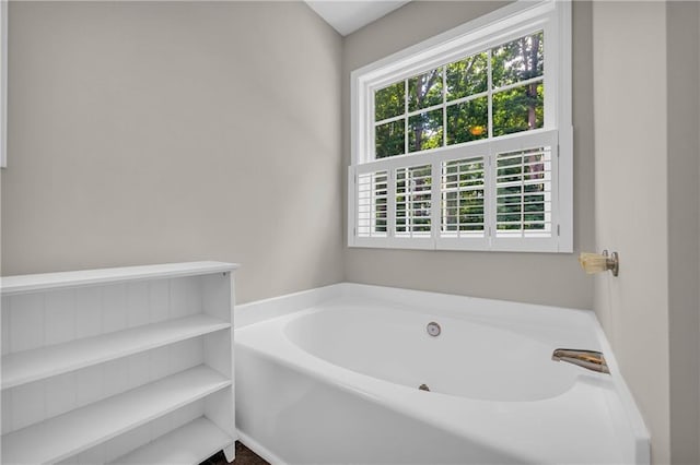 full bath featuring a bath