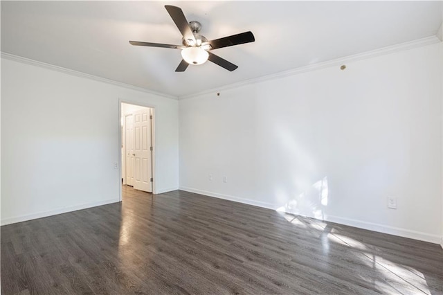 empty room featuring ceiling fan, dark hardwood / wood-style flooring, and crown molding