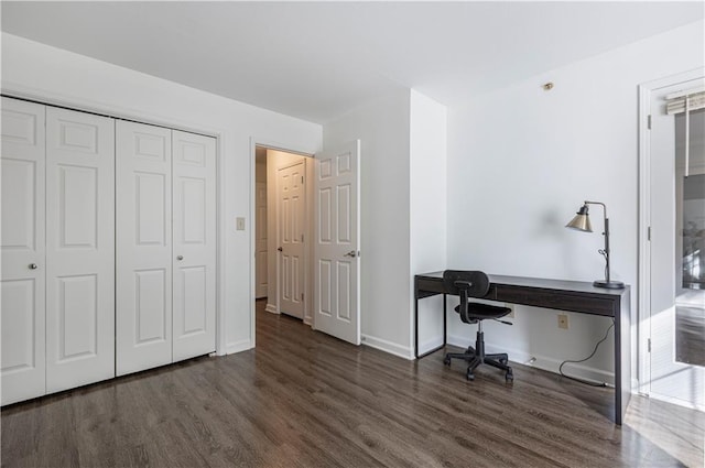 office space featuring dark wood-type flooring