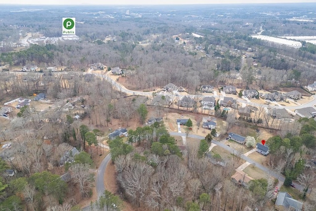 bird's eye view featuring a view of trees