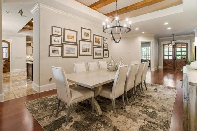 dining room featuring beamed ceiling, wood-type flooring, ornamental molding, and french doors