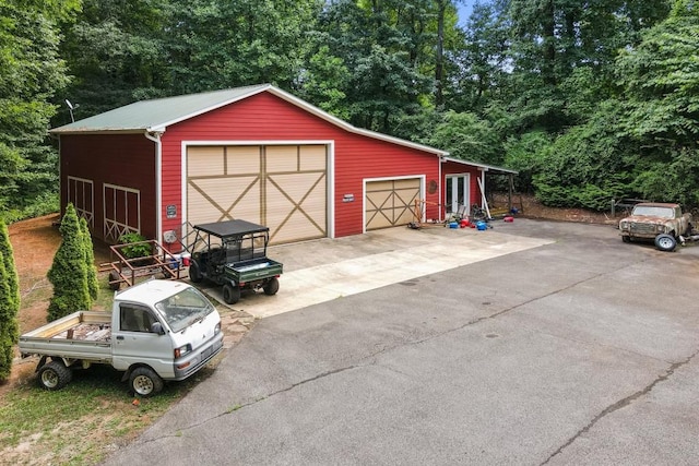 view of outbuilding with a garage