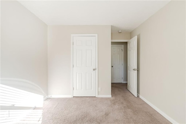 4412 Rustic Wood Dr, Stone Mountain, GA 30083 - unfurnished bedroom featuring light colored carpet and a closet