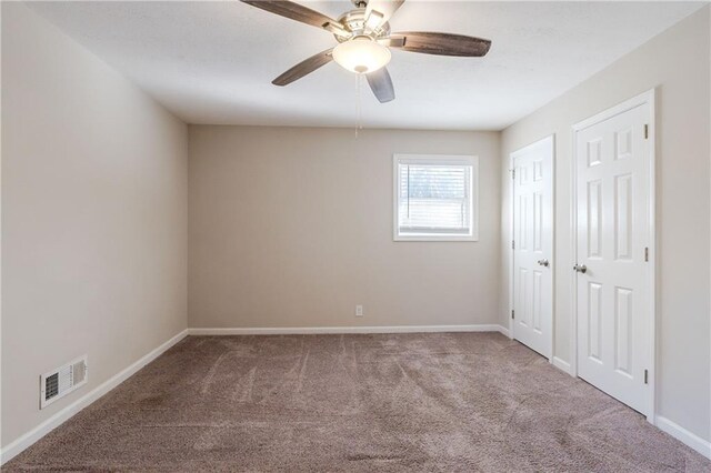 4412 Rustic Wood Dr, Stone Mountain, GA 30083 - unfurnished room featuring carpet and ceiling fan