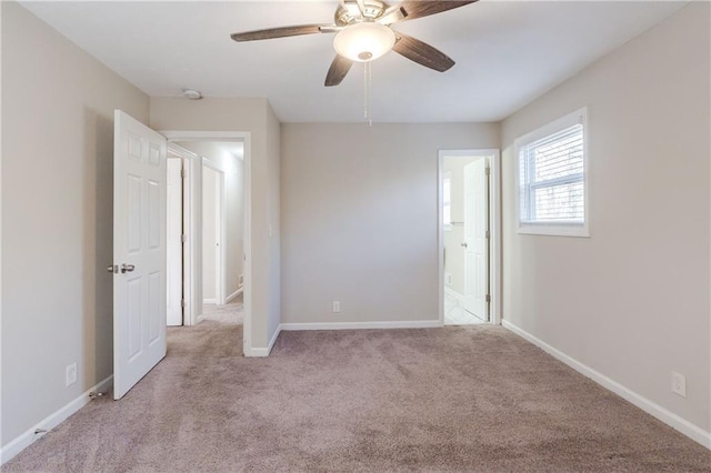 4412 Rustic Wood Dr, Stone Mountain, GA 30083 - unfurnished bedroom featuring ceiling fan and light colored carpet