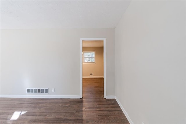 4412 Rustic Wood Dr, Stone Mountain, GA 30083 - empty room featuring dark wood-type flooring