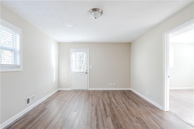 4412 Rustic Wood Dr, Stone Mountain, GA 30083 - unfurnished room featuring dark hardwood / wood-style flooring