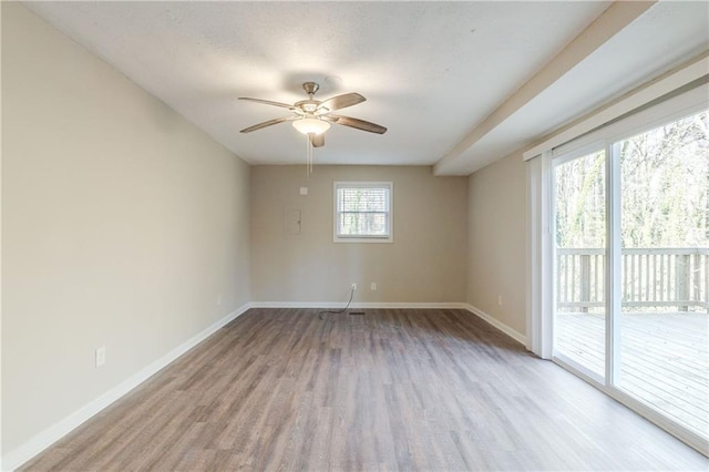 4412 Rustic Wood Dr, Stone Mountain, GA 30083 - empty room with light wood-type flooring and ceiling fan