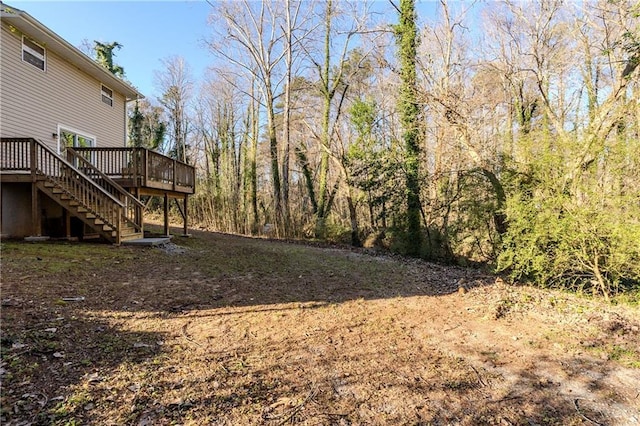 4412 Rustic Wood Dr, Stone Mountain, GA 30083 - view of yard featuring a wooden deck
