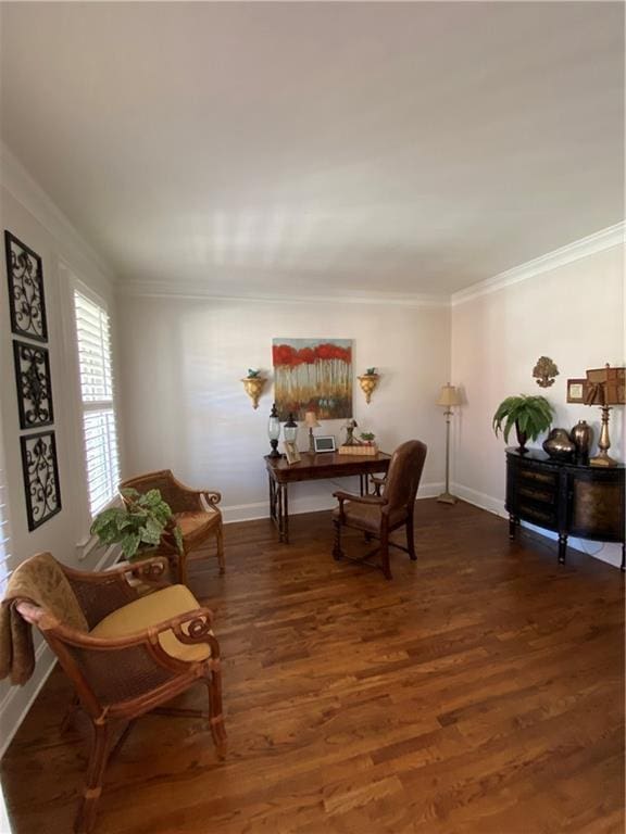 sitting room featuring dark wood-type flooring and ornamental molding