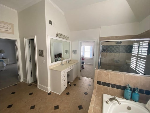 bathroom featuring high vaulted ceiling, vanity, ornamental molding, plus walk in shower, and tile patterned floors