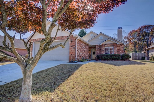 view of front property featuring central AC, a front yard, and a garage