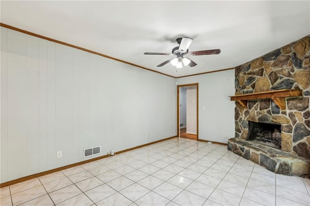 unfurnished living room featuring visible vents, a fireplace, ceiling fan, crown molding, and baseboards