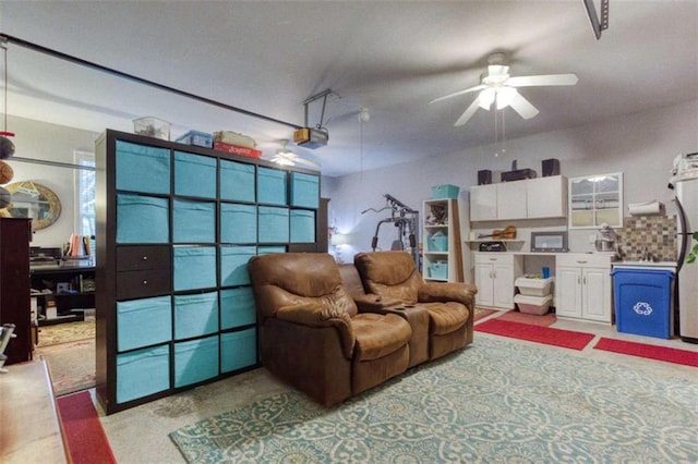 living area with ceiling fan