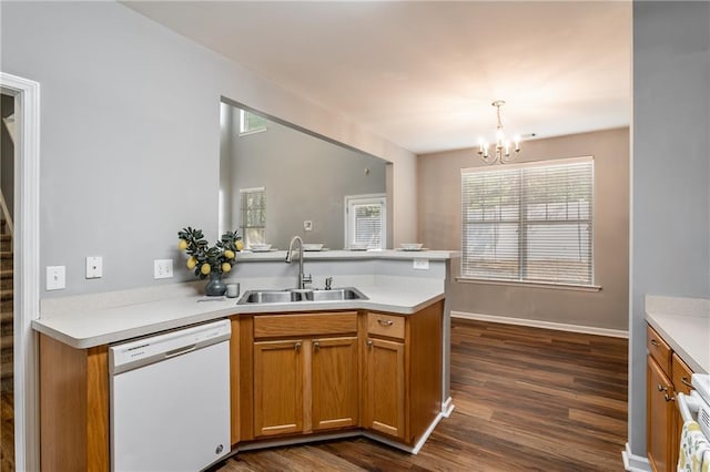 208 Oconee Way, Canton, GA 30114 - kitchen with dishwasher, a sink, a peninsula, a chandelier, and dark wood-style flooring
