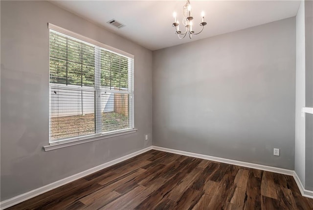 208 Oconee Way, Canton, GA 30114 - unfurnished room with plenty of natural light, a chandelier, dark wood-style floors, and baseboards